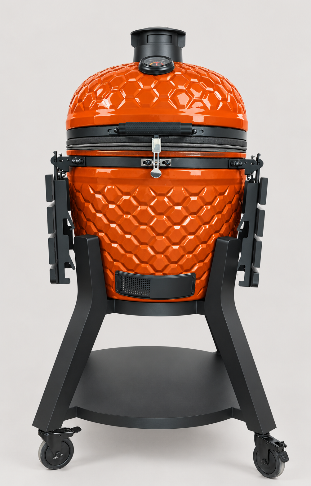 Kamado Moe ultra-honeycomb 22″ Orange Gloss — AI finish illustration; source-model reference.